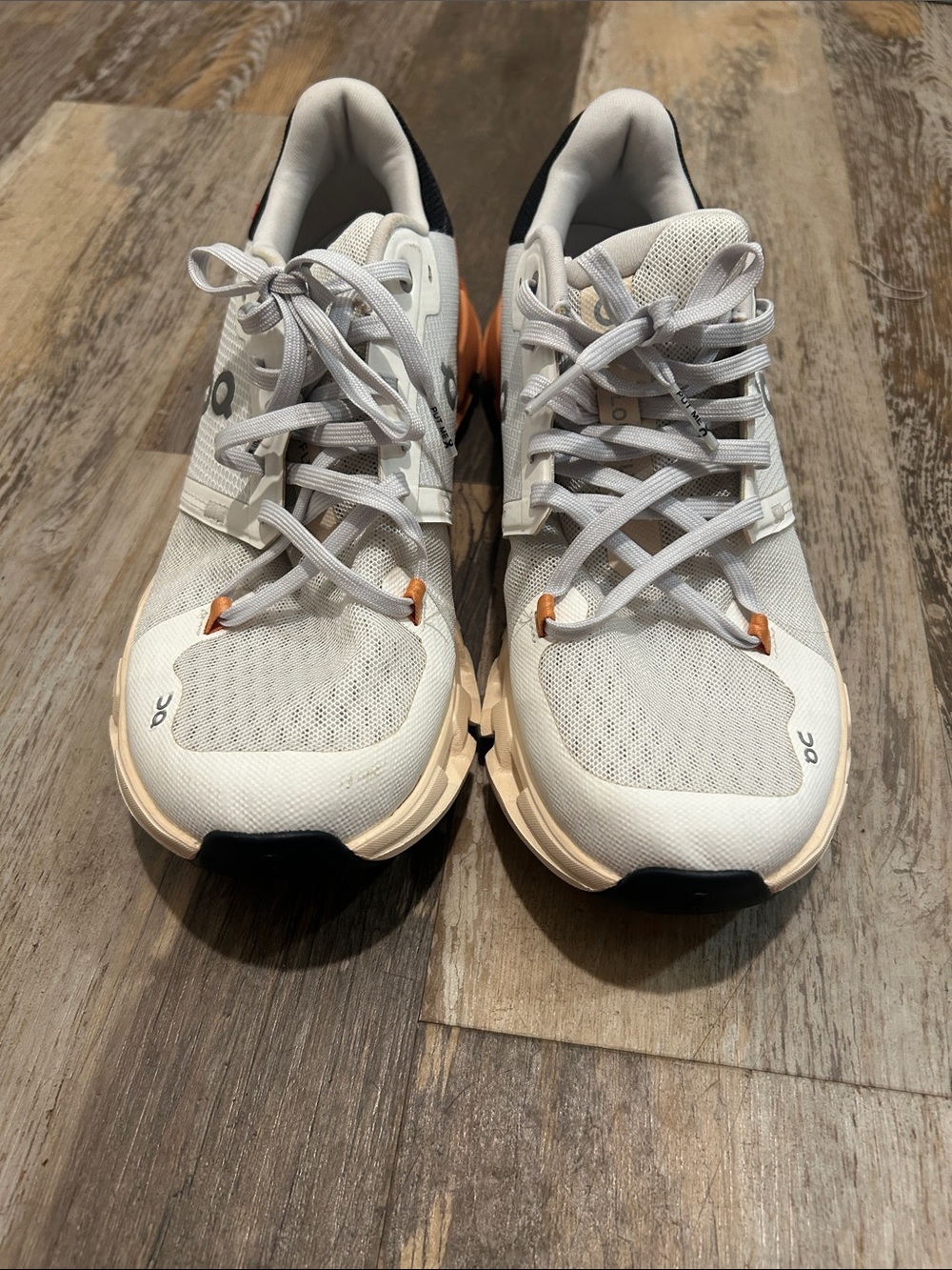 On Running Women's White Sneakers with Peach Accents